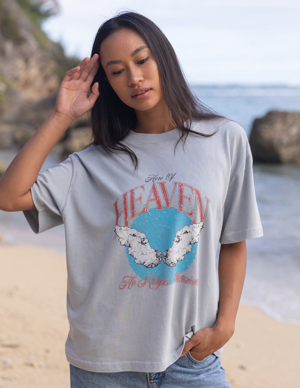 Elevated Faith Christian Apparel T-Shirt with a graphic design featuring 'Heaven' and cloud imagery
