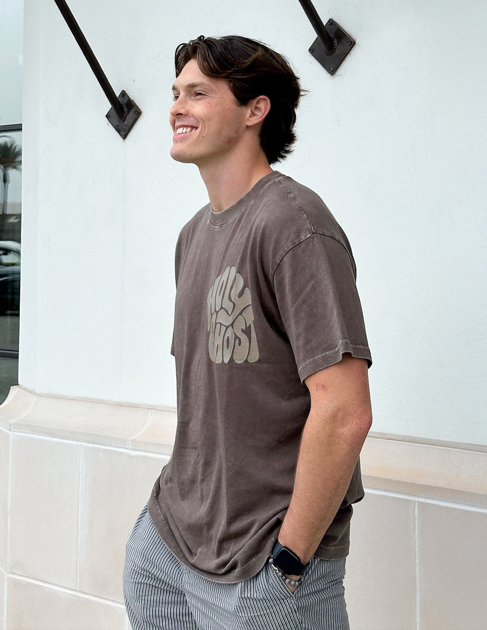 Elevated Faith Christian Apparel T-Shirt in brown featuring a bold Holy Ghost graphic design