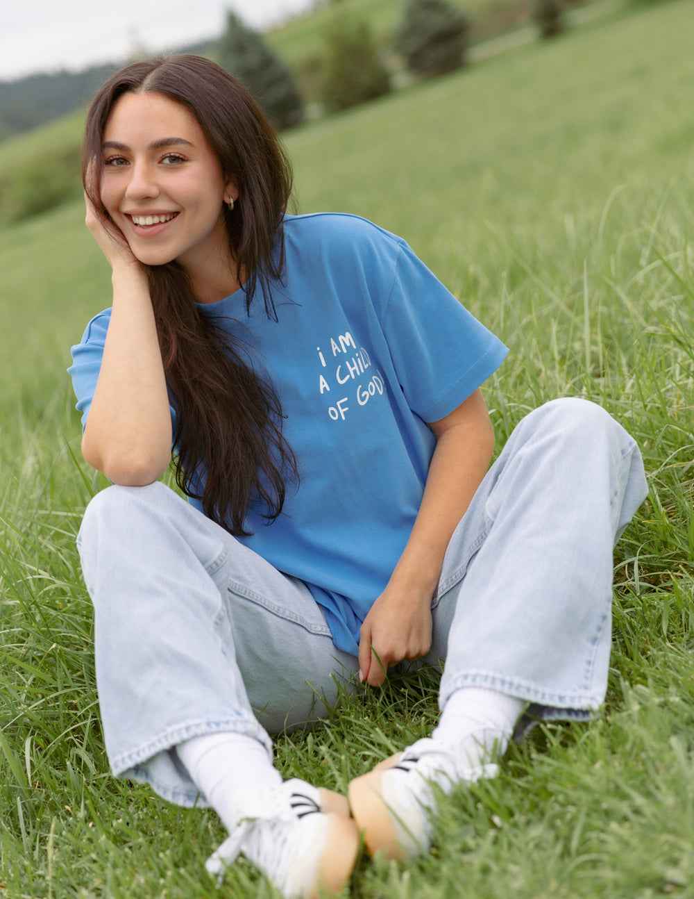 Elevated Faith Christian Apparel T-Shirt in blue with text I Am a Child of God, perfect for casual wear