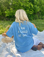 Elevated Faith Blue Christian Apparel T-Shirt with 'I Am a Child of God' Design on Back