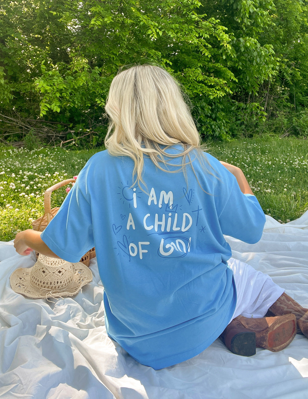 Elevated Faith Blue Christian Apparel T-Shirt with 'I Am a Child of God' Design on Back
