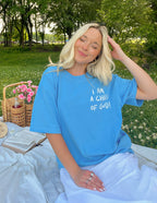 Blue Elevated Faith Christian Apparel T-Shirt featuring the quote I am a child of God