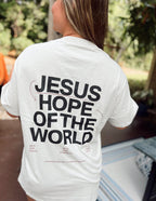 Elevated Faith Christian Apparel T-Shirt featuring bold 'Jesus Hope of the World' print on the back