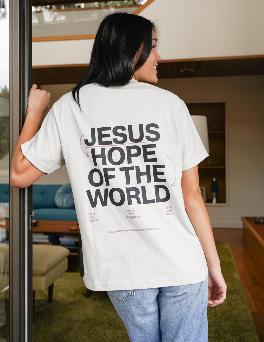 Elevated Faith Christian Apparel T-Shirt featuring 'Jesus Hope of the World' text on the back