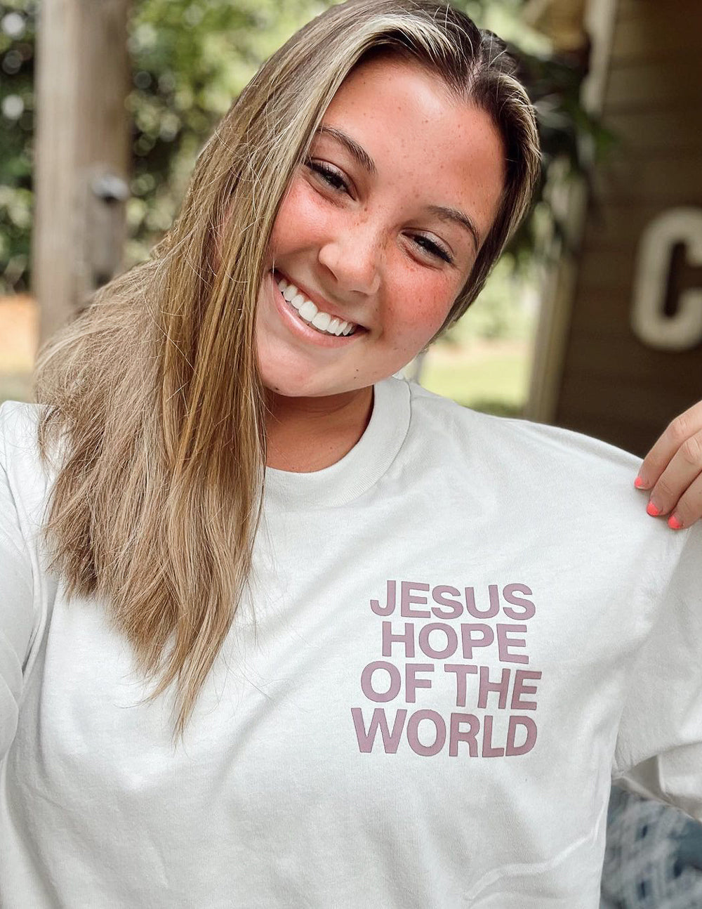 Elevated Faith Christian Apparel T-Shirt featuring 'Jesus Hope of the World' design in a white color
