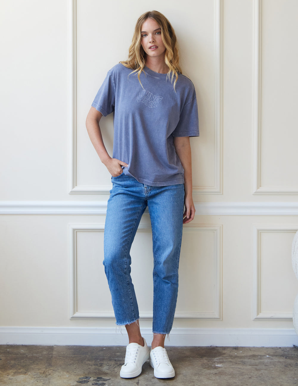 Elevated Faith Christian Apparel T-Shirt in blue worn with jeans for a casual look