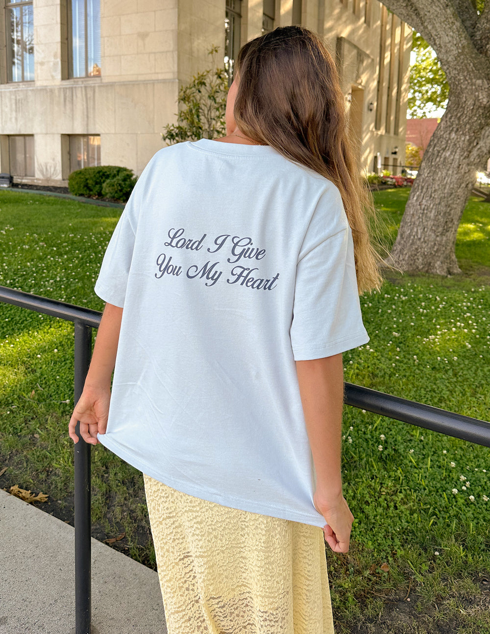 Light blue Christian Apparel T-Shirt with 'Lord I Give You My Heart' printed on the back