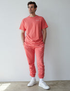 Elevated Faith Christian Apparel T-Shirt in coral color, styled with matching joggers for a trendy look