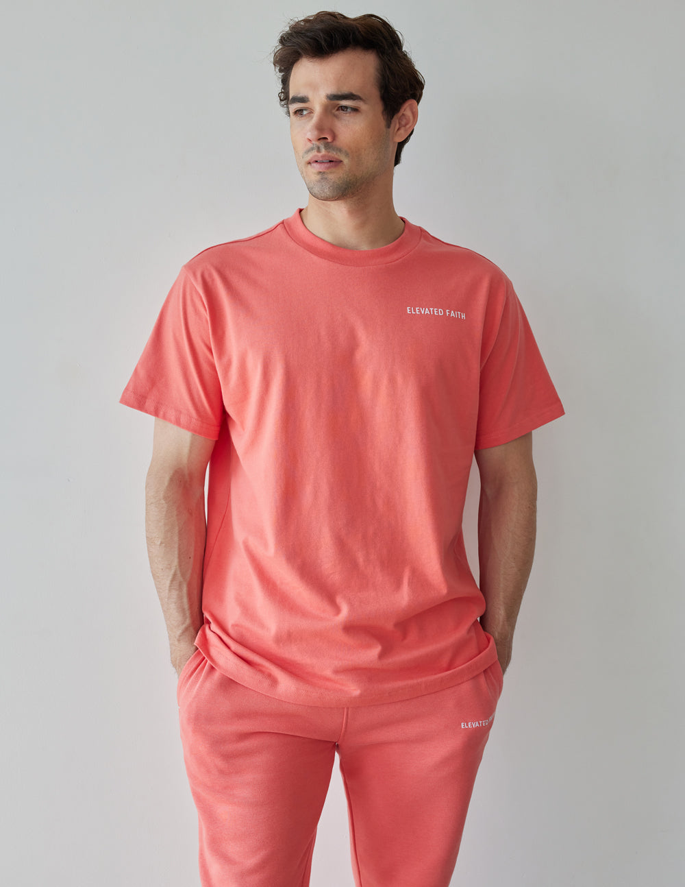 Elevated Faith Christian Apparel T-Shirt in coral color, perfect for casual and faith-inspired outfits