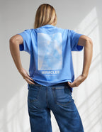 Elevated Faith Christian Apparel T-Shirt in Light Blue with 'Miracles' Graphic on the Back