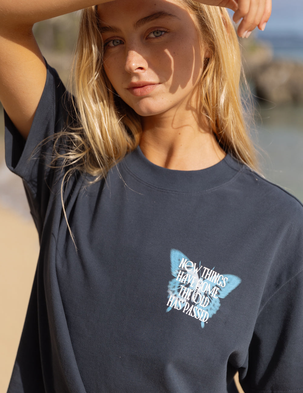 Elevated Faith Christian Apparel T-Shirt in navy featuring a butterfly and inspirational text design