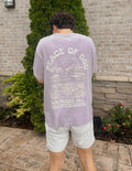 Men's Elevated Faith Christian Apparel T-Shirt in lavender with 'Peace of God' graphic design on the back