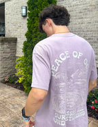 Elevated Faith Christian Apparel T-Shirt with 'Peace of God' graphic design in lavender color
