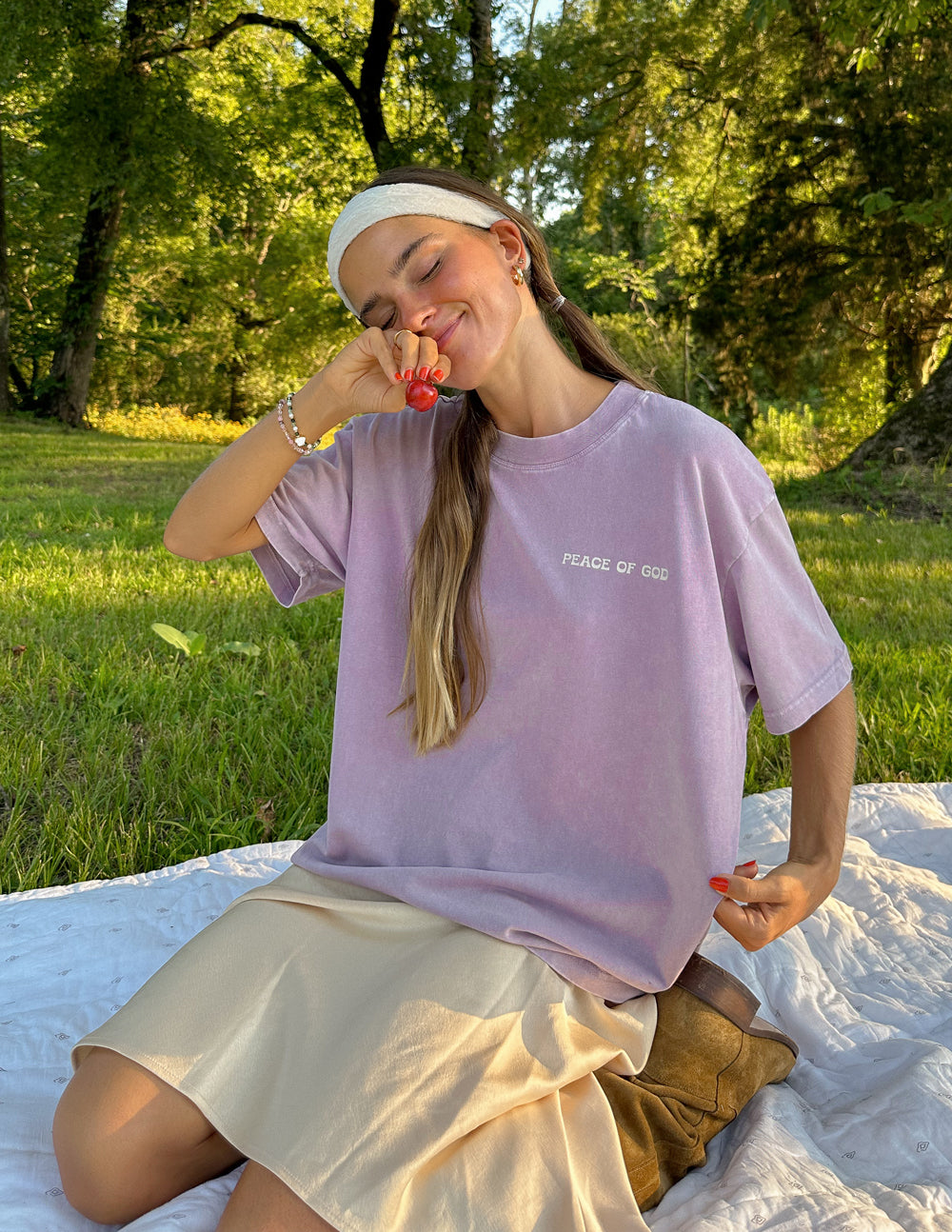 Elevated Faith Christian Apparel T-Shirt in lavender featuring the text Peace of God, perfect for casual wear.