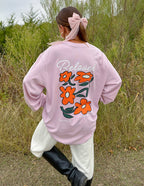 Elevated Faith Christian Apparel T-Shirt in pink featuring floral design on the back