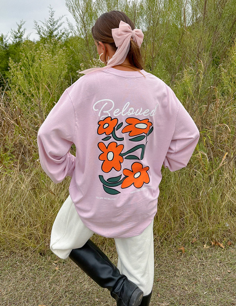 Elevated Faith Christian Apparel T-Shirt in pink featuring floral design on the back