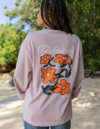 Elevated Faith Christian Apparel T-Shirt in light pink with a colorful floral 'Beloved' graphic on the back