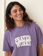 Purple Elevated Faith Christian Apparel T-Shirt with 'Prayer Works' graphic for casual wear
