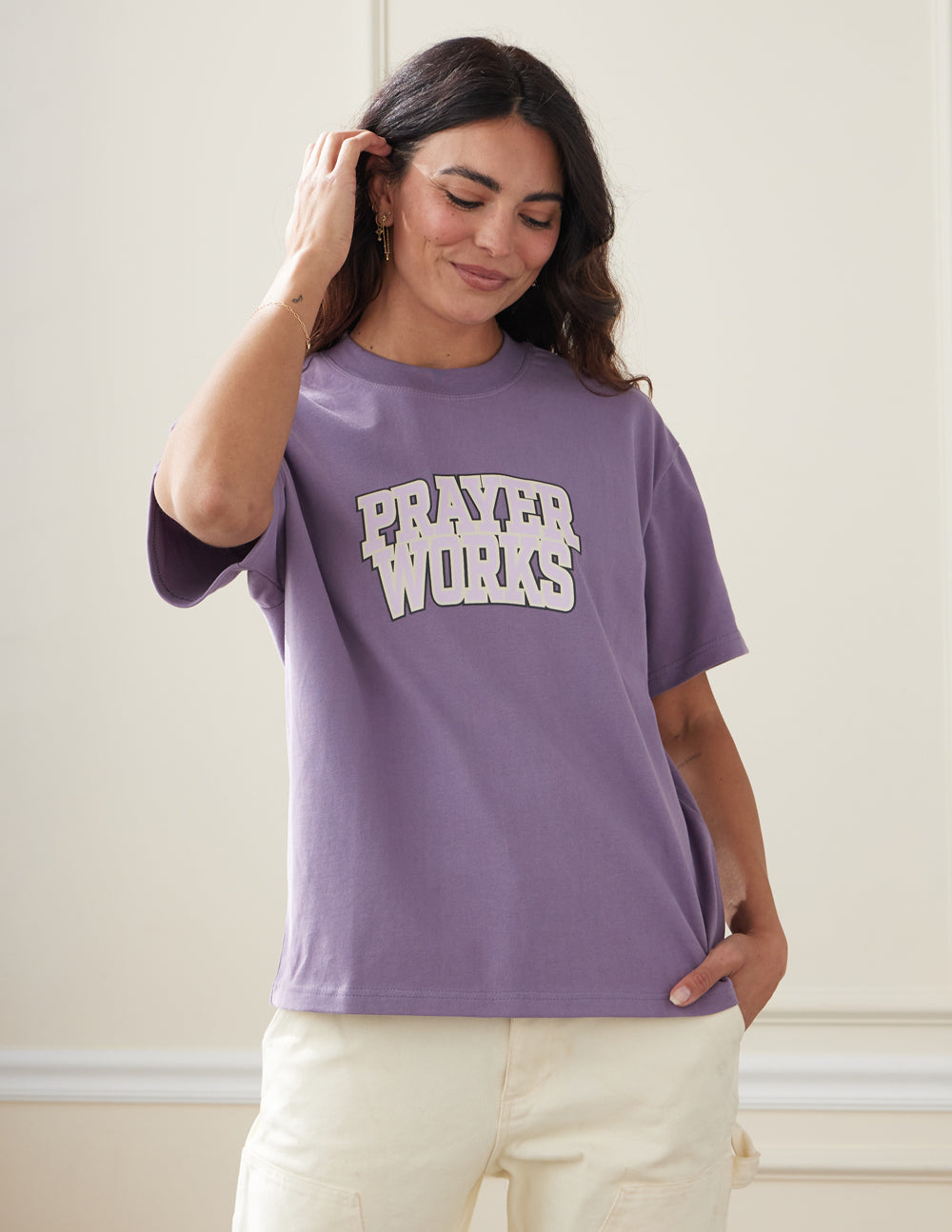 Elevated Faith Christian Apparel T-Shirt in Purple featuring 'Prayer Works' design for casual wear