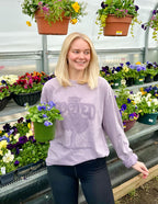 Elevated Faith Stay Rooted Christian Apparel T-Shirt in lavender with floral background