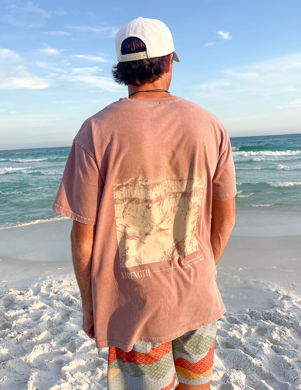 Men's Elevated Faith Christian Apparel T-Shirt with a strength graphic on the back, perfect for beachwear