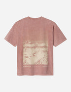 Elevated Faith Christian Apparel T-Shirt featuring a mountain graphic and strong message on a soft pink background