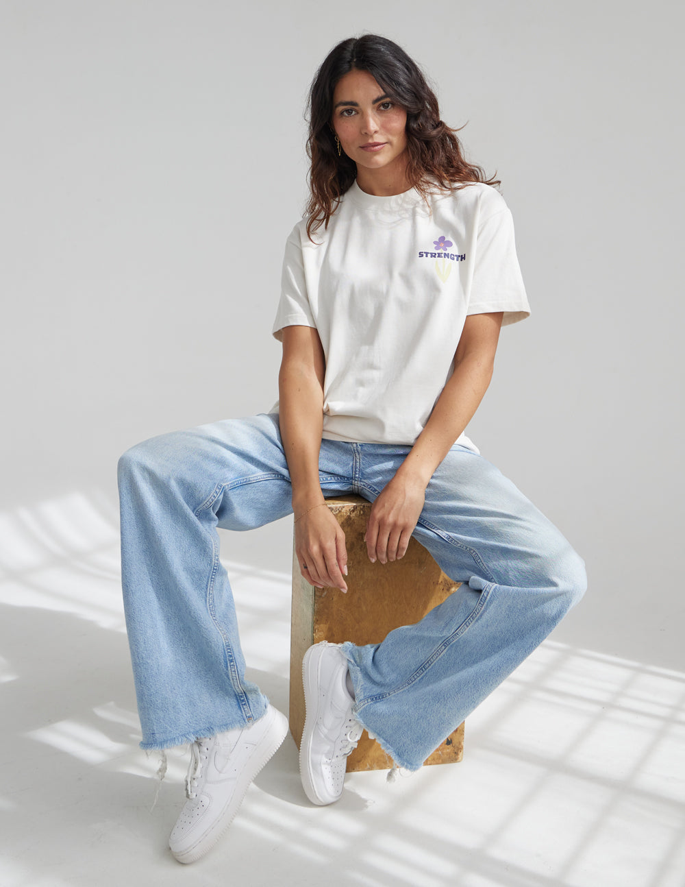 Elevated Faith Christian Apparel T-Shirt in cream with a stylish graphic design