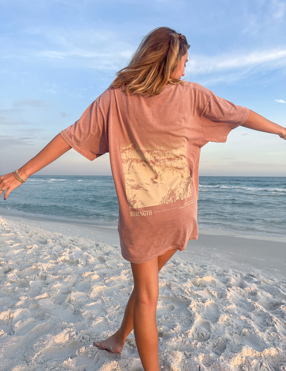 Elevated Faith Christian Apparel T-Shirt in soft pink with a scenic graphic on the back