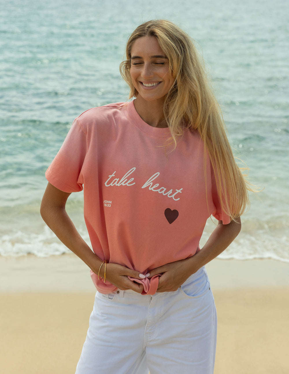 Elevated Faith Christian Apparel T-Shirt in coral with 'take heart' design for casual wear
