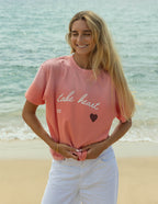 Elevated Faith Christian Apparel T-Shirt in coral with 'take heart' design for casual wear