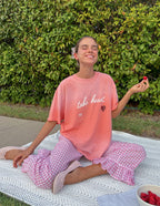 Elevated Faith Christian Apparel T-Shirt in pink with 'take heart' print, perfect for casual wear