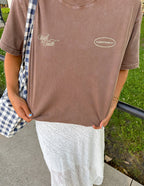 Elevated Faith Christian Apparel T-Shirt in brown with 'Walk by Faith' design and verse reference