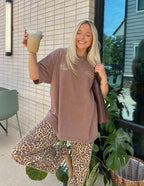 Elevated Faith Christian Apparel T-Shirt in brown, styled with casual leopard print pants outdoors