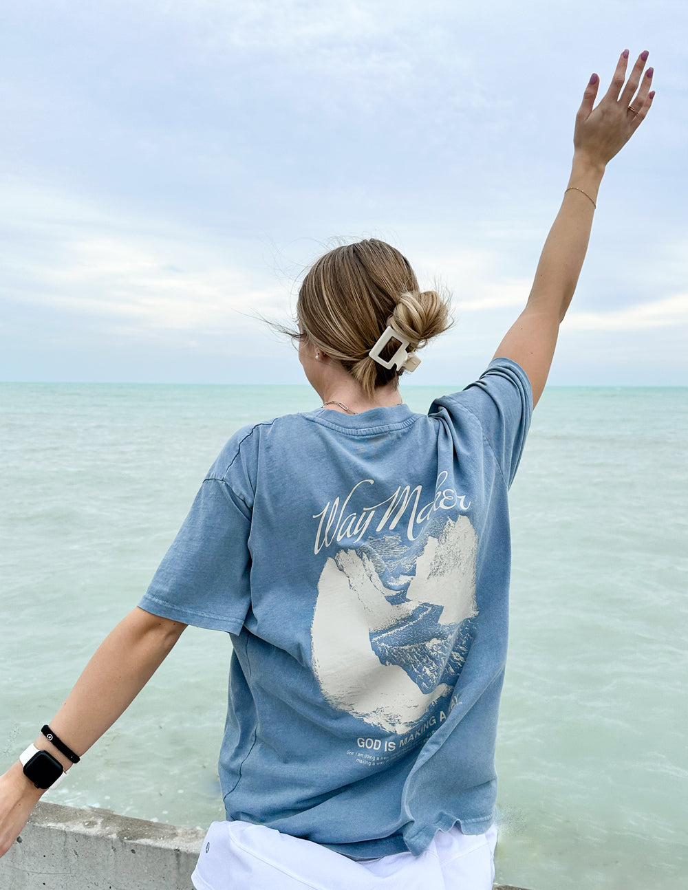 Elevated Faith Christian Apparel T-Shirt featuring a scenic design near the water