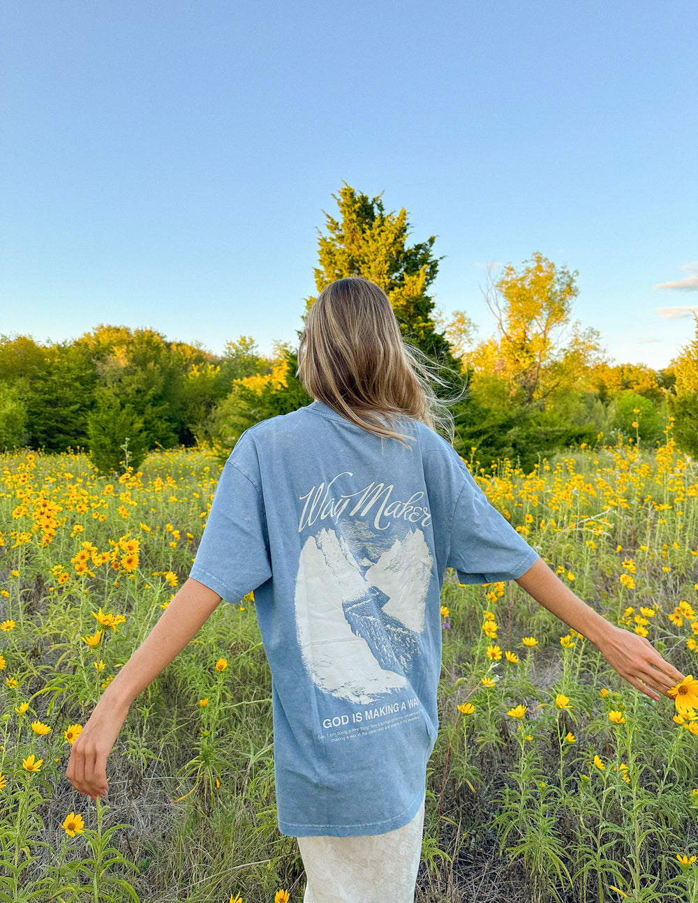 Elevated Faith Christian Apparel T-Shirt in blue with a nature-inspired design and uplifting message