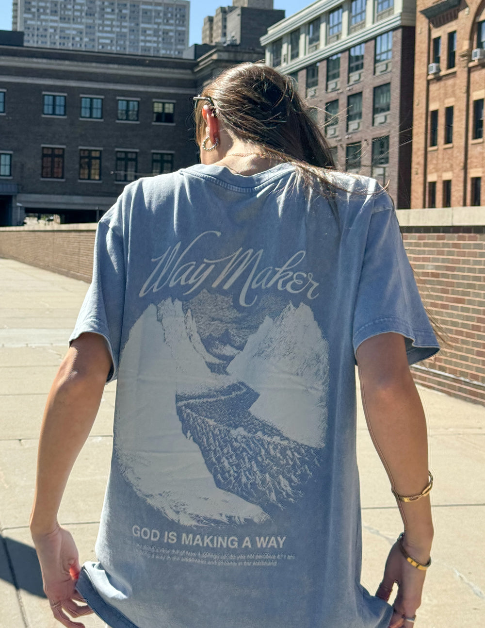 Elevated Faith Christian Apparel T-Shirt featuring a scenic Way Maker design on back