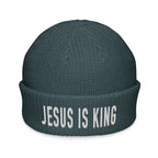 Rep The One Christian Beanie in dark color with 'Jesus is King' embroidered text