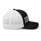 Black and white Christian Hat with the word JESUS prominently displayed on the front