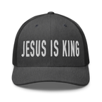 Black Christian Hat with white embroidered text reading Jesus Is King for faith-inspired fashion