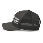 Gray trucker Christian Hat with bold lettering proclaiming 'IS KING' for faith-based fashion