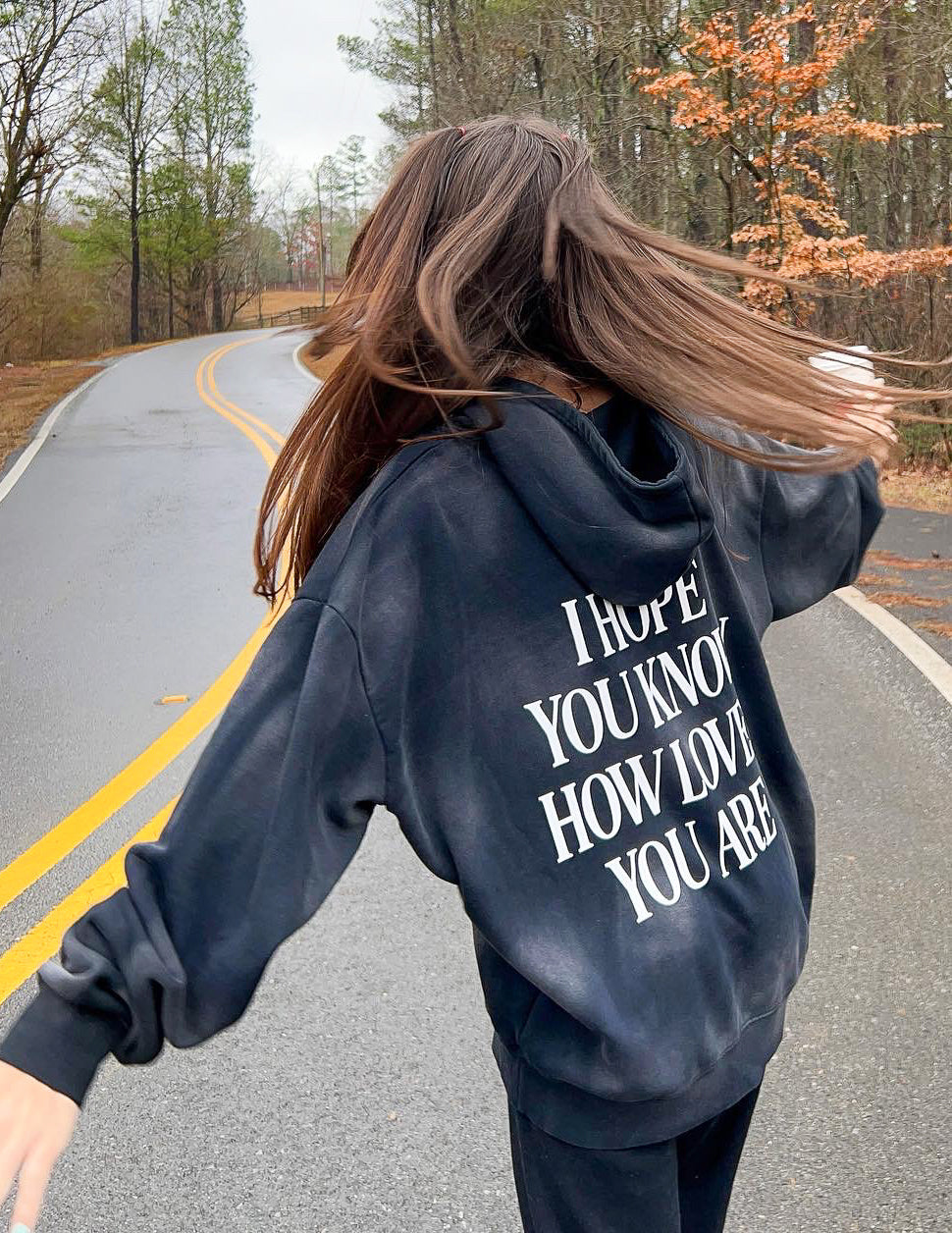 Elevated Faith Christian Hoodie featuring inspirational text on a cozy design for everyday wear
