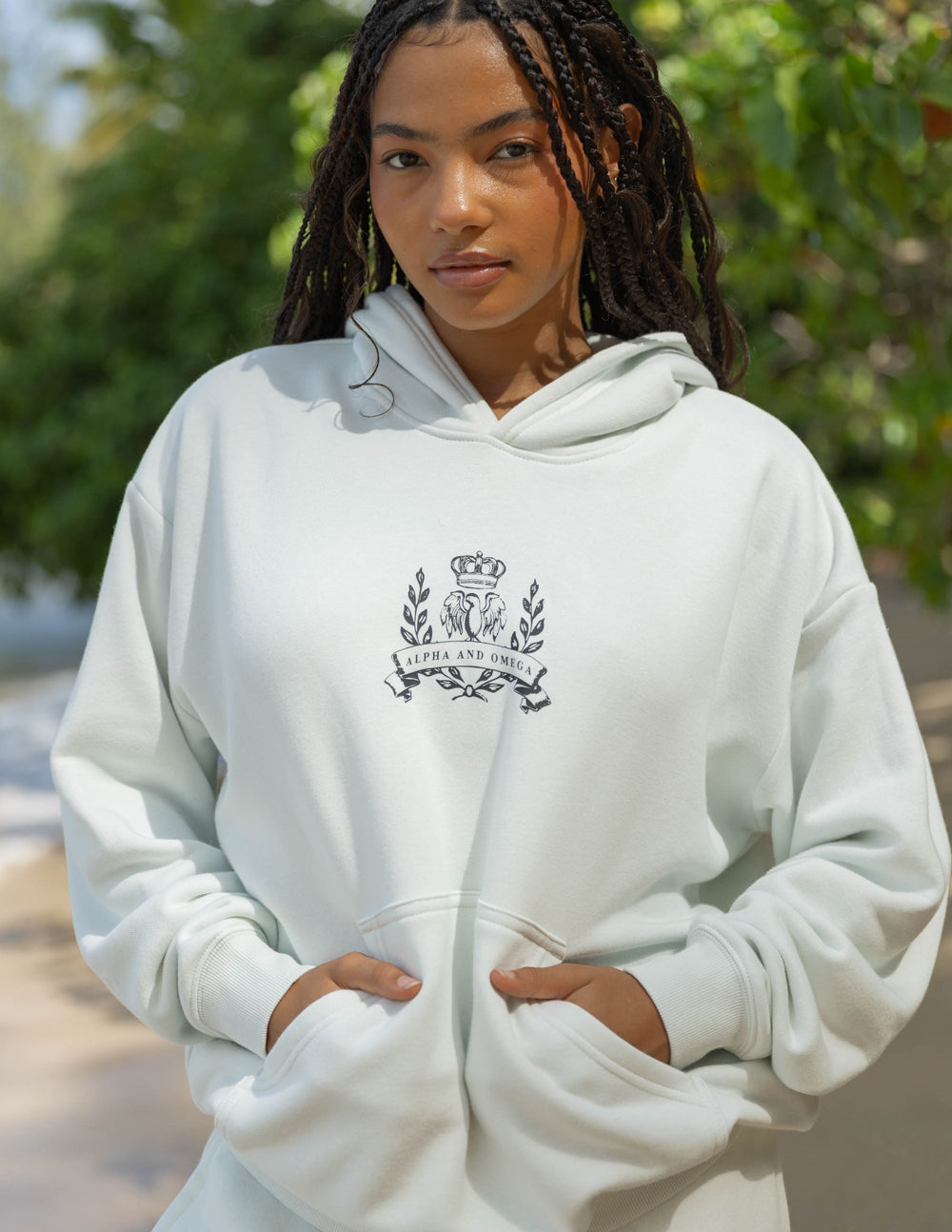 Elevated Faith Christian Hoodie in Light Color with Front Pockets and Unique Graphic Design
