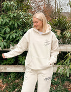 Elevated Faith Christian Hoodie in Cream Color featuring Inspirational Text and Front Pocket
