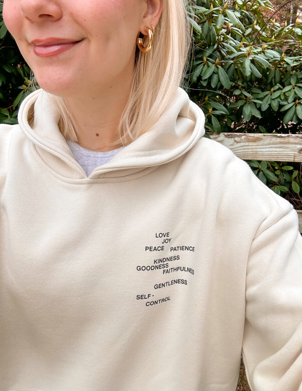 Elevated Faith Christian Hoodie in cream with inspirational words embroidered on the front