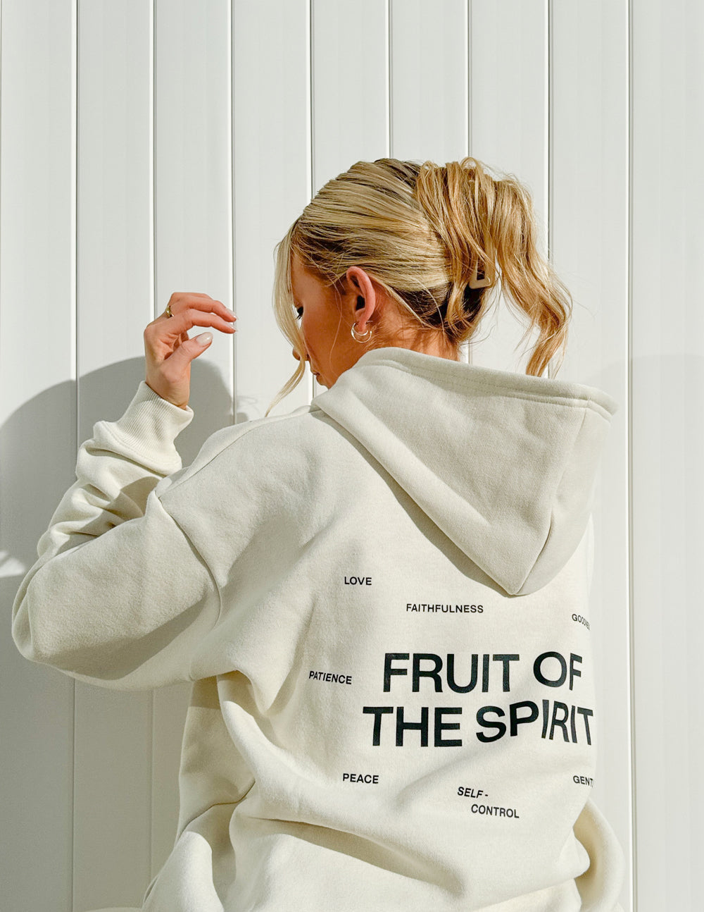 Elevated Faith Christian Hoodie featuring 'Fruit of the Spirit' design on the back in soft fabric