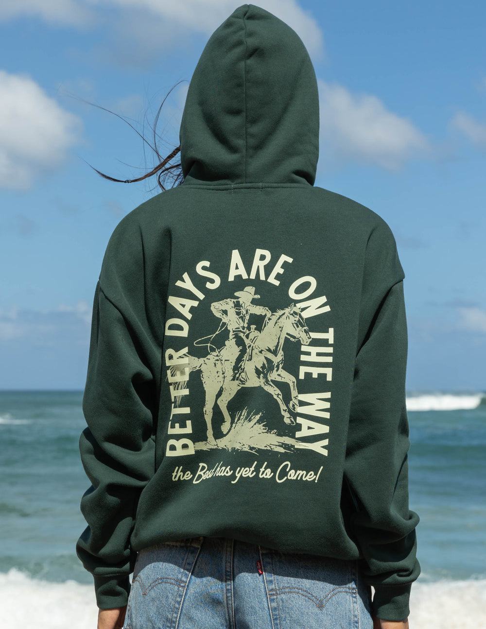 Elevated Faith Christian Hoodie in Dark Green with Inspirational Cowboy Graphic on Back