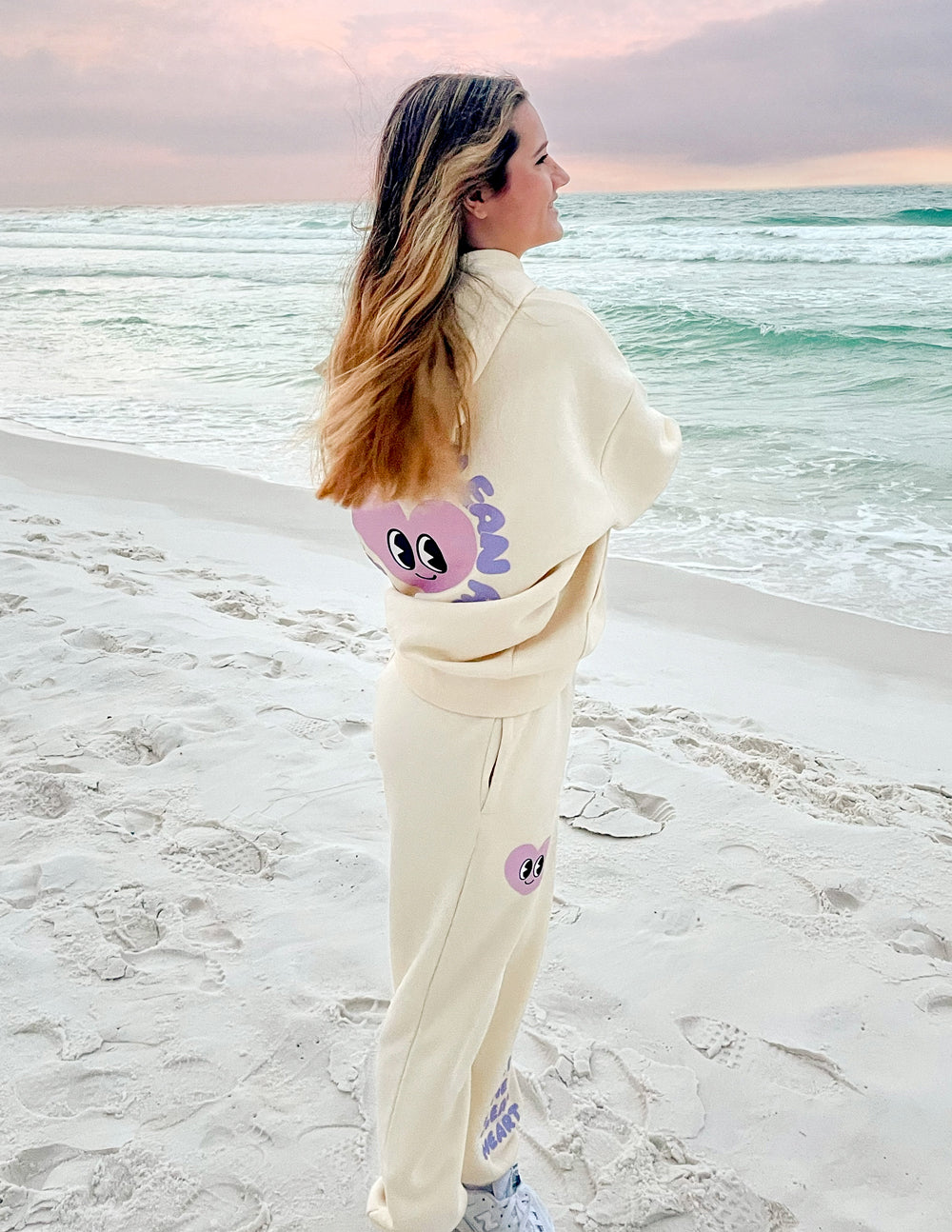 Elevated Faith Christian Hoodie in beige with playful graphics, perfect for casual beach outings