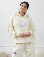 Elevated Faith Christian Hoodie in cream color with playful graphics and cozy fit