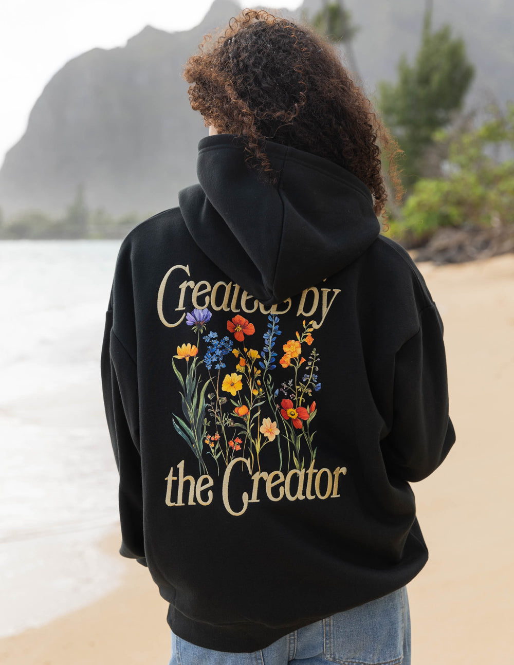 Elevated Faith Christian Hoodie with floral design and 'Created by the Creator' text on the back
