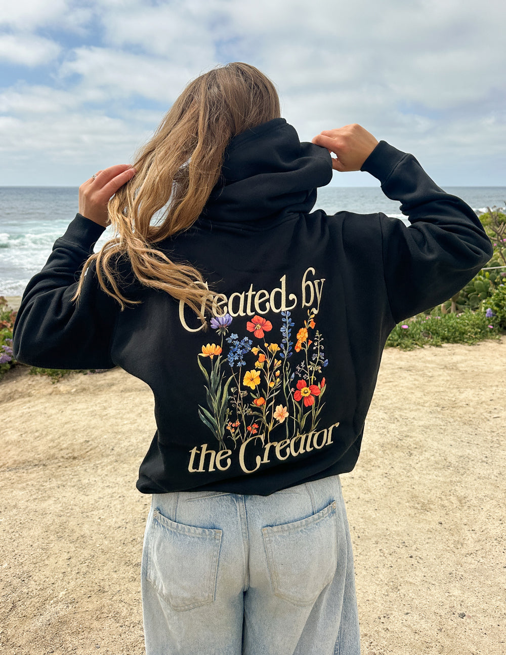 Elevated Faith Christian Hoodie with floral design and Created by the Creator text on the back